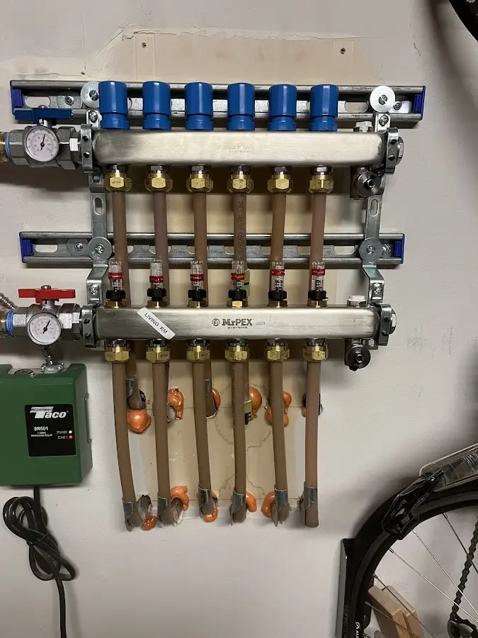 Plumber performing Leak Detection at a residential property in St. Francis