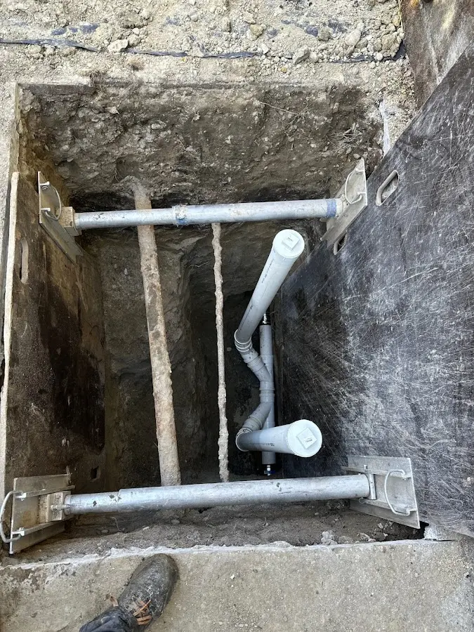 Experienced plumber completing Drain Cleaning work in St. Francis